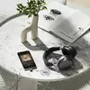 BDT 700 dongle with Sennheiser HDB 630 headphones in interior
