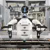 Miniatura - Robot humanoide en fábrica de BMW