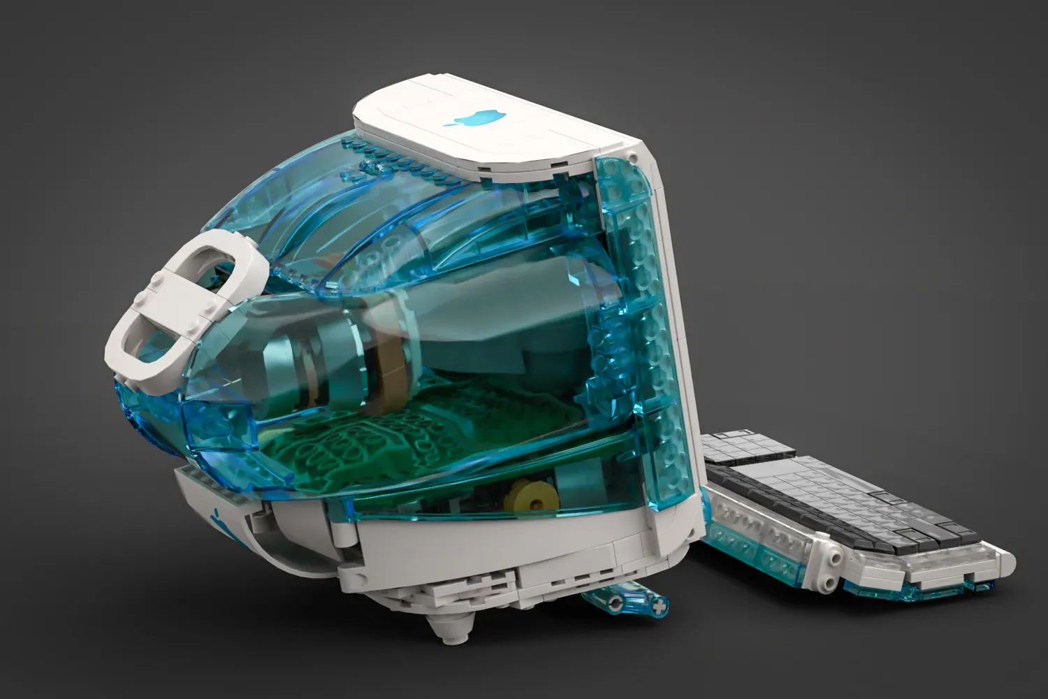 iMac G3 con teclado y mouse en forma de disco