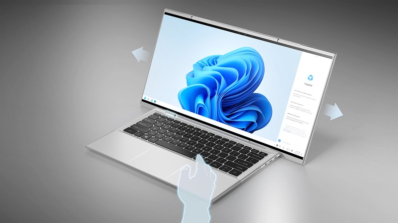 Portátil Compal con pantalla retráctil en acción Portátil Compal con pantalla retráctil en acción
