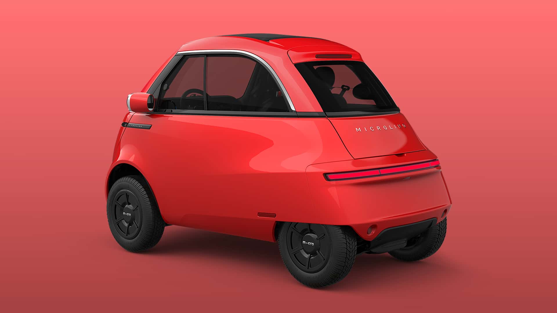 Microlino en rojo - vista lateral